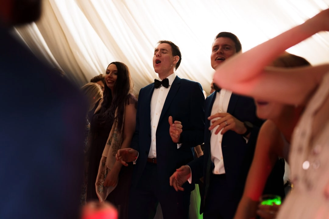 guests dance at the wedding